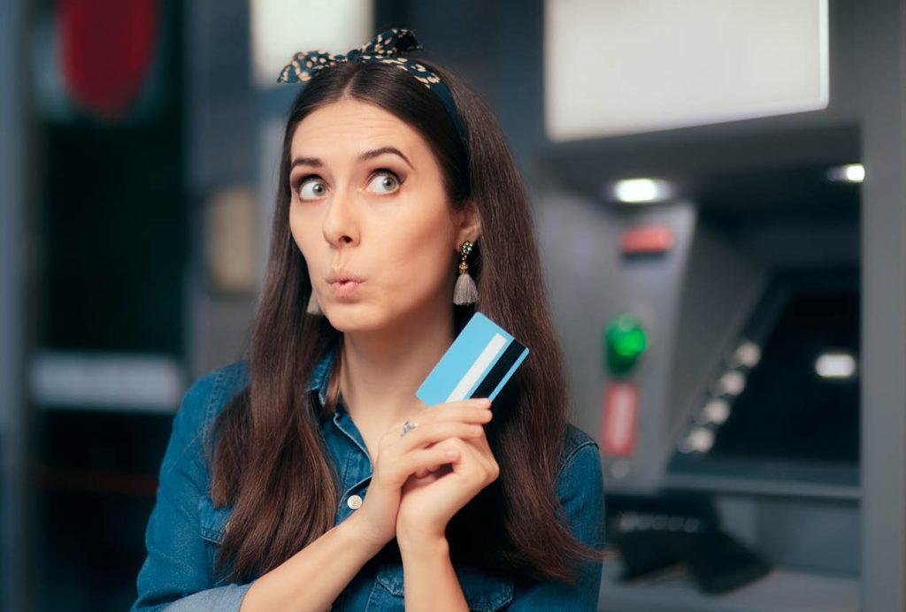 Woman wondering about the changes to her debit card controls.